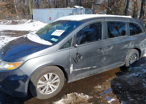 2011 Honda Odyssey Ex-L из США, поврежденный, VIN 5FNRL5H69BB070931